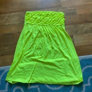 Yellow swimsuit cover up. Has ruffles at top